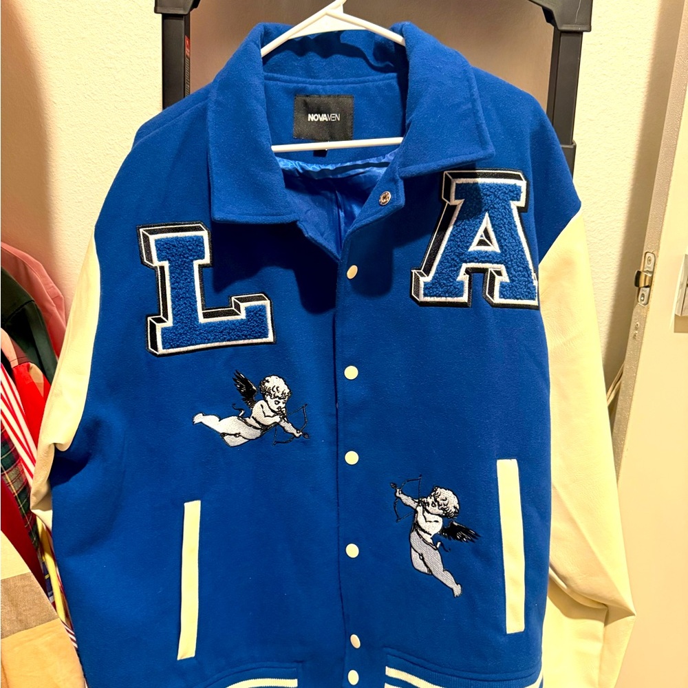 Blue and White Varsity Jacket with Angel Patches